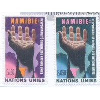 ONU GENEVE - 1975 - A NAMÍBIA: RESPONSABILIDADE DIRETA DAS NAÇÕES UNIDAS - MÃO PARA O CÉU - SÉRIE 2 SELOS - MINT - Y 0052/53