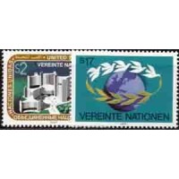 ONU VIENA - Y 073/74 (1987) SÉRIE CORRENTE - EDIFÍCIO DO CENTRO INTERNACIONAL DE VIENA E GLOBO TERRESTRE RODEADO POR POMBAS E RAMO DE OLIVEIRA -SÉRIE 2 SELOS MINT