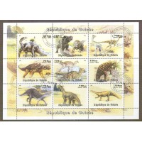 GUINÉ - DINOSSAUROS - BLOCO COM 9 SELOS