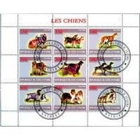 COSTA DO MARFIM - CACHORROS 2009 - SÉRIE COM 9 SELOS USADOS EMITIDOS EM FOLHINHA